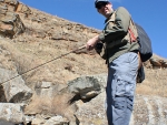 Warren Fishing A Pool